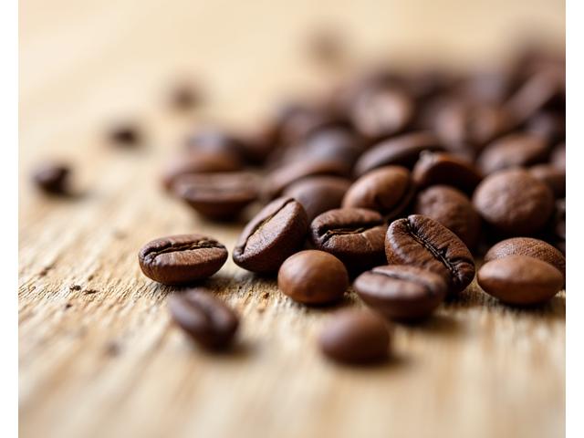 Close-up of premium single-origin coffee beans with distinct varied textures.